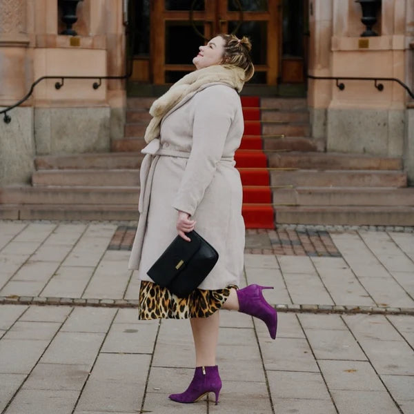 Roccamore rebel wearing purple boots in the street
